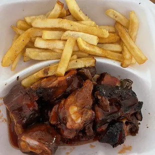 Rib tips and fries. We had a 15 min drive before we could eat and the fries were still good and not soggy. Great seasoning on them!