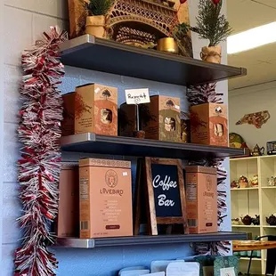 a shelf of coffee and pastries