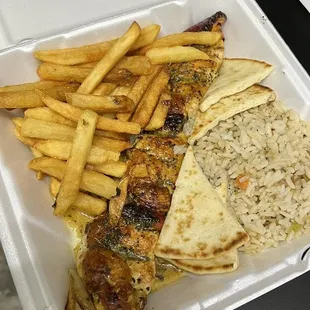 a meal in a styrofoam container
