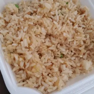 Food looks like it's been sitting out for awhile so decided to only order the rice. It was flavorless do not come in here!