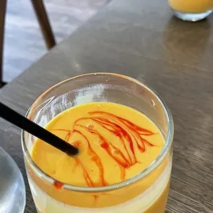 Mango Lassi with grenadine syrup I think