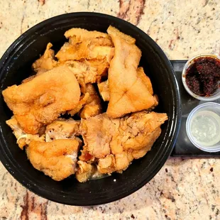 Marinated Fried Pig Feet with hot red chile oil and seasoned rice vinegar.