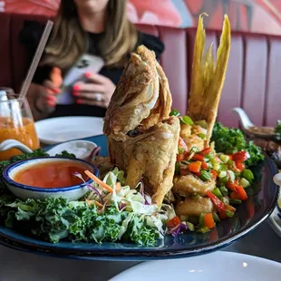 Salt and Pepper Fish. Market price $55. Yellowtail snapper, flash-fried whole fish, scallions, cilantro, roasted garlic, minced chili.