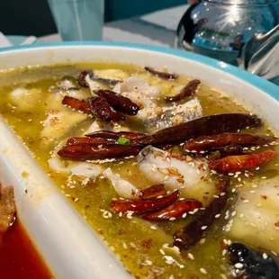 Sour pickles green mustard fish