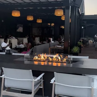 outdoor seating area with fire pit