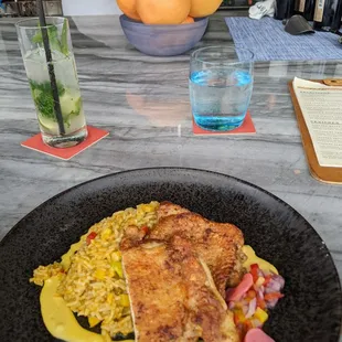 Great signature plate,chicken thighs were perfect and incredible rice flavors. Mojito was great as well. Stop by you won&apos;t be disappointed