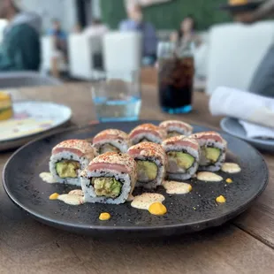 a plate of sushi on a table
