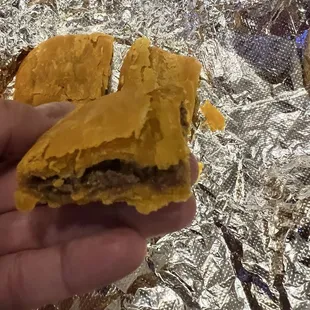 Meat patty comes with a white dipping sauce