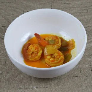 a bowl of shrimp and vegetables