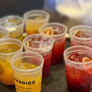a variety of drinks on a tray