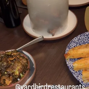Smoked spare ribs, crispy Brussels sprouts and roasted corn.