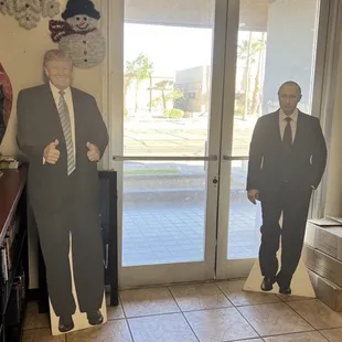 Life-size cutouts of Putin and Trump in Yasha lobby? Supposed to be funny?