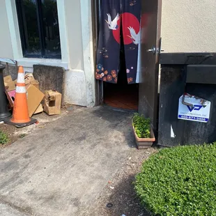 Still trash outside the back door and it was wide open....