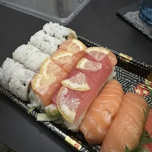 Spicy Salmon Roll (left), Yuki Roll (middle), Salmon Sushi (right)