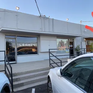 View from the back parking lot - Yashima's door is marked with my red arrow.