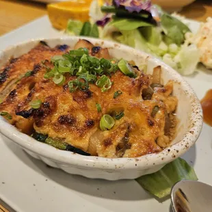 Scallop dynamite - inside includes small scallops, zucchini, onion. I would pass on this next time