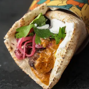 a pita filled with meat and vegetables