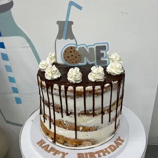 a cake with a cookie on top