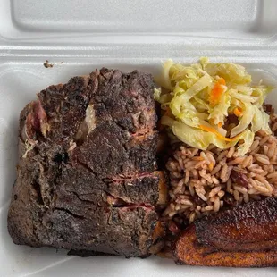 a meal in a styrofoam container