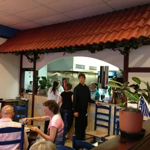 a group of people in a restaurant