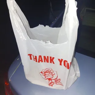 a thank you bag on a car