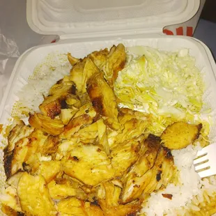 chicken and rice in a styrofoam container