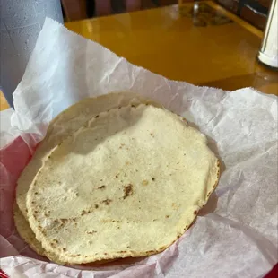 Three corn tortillas with my menudo and I'm by myself!