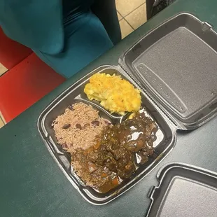 Oxtails, Mac and cheese, rice n Jamaican Rice and Peasrice