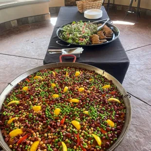 Paella, salad and bread