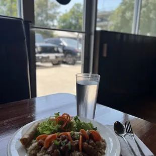 Orange chicken, fried rice, said