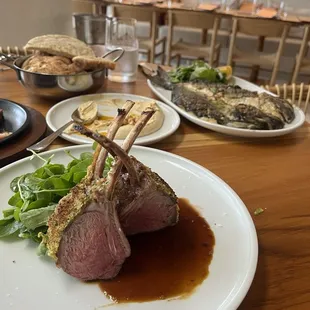 Pistachio crusted lamb chops and grilled Dorade.