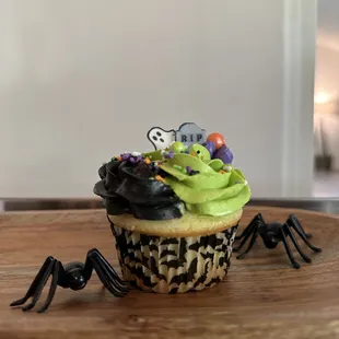 a cupcake decorated like a spider
