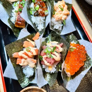 Assortment of 5 Sushi Bites (baby scallop, spicy salmon, spicy tuna, ikura, eel)