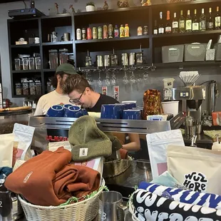 two men working in a coffee shop