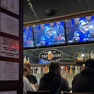 people sitting at a bar