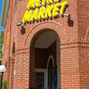 the entrance to the metro market