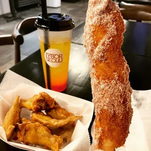 Wings, sausage corn dog (highly recommend) and passion fruit tea with strawberry jelly add-on