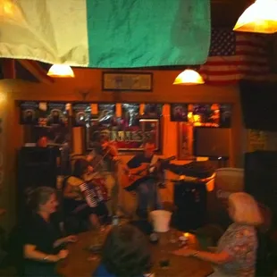 a group of people sitting around a table