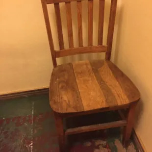 Chair in front of the ladies toilet for when you need somebody to hold your hand. Lol