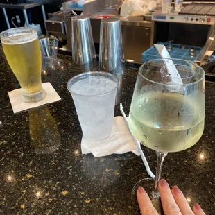 a person holding a glass of wine