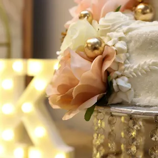 a closeup of a wedding cake