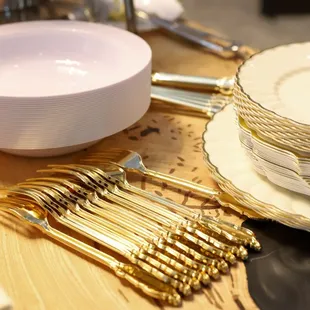 a table setting with plates and silverware