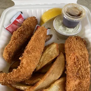 Steelhead Fish and Chips, fries, and condiments.