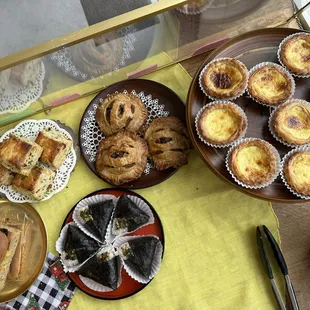 sausage + garlic chive biscuit, meat pie, onigiri and egg tarts