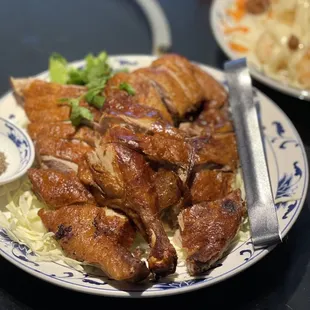 a plate of chicken and rice