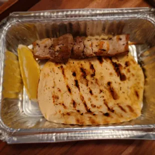 Pork souvlaki with grilled pita