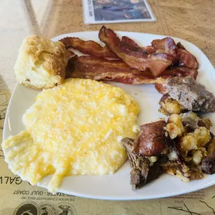 Cajun potato, cheese girts, bacon, sausage and biscuits.