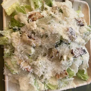 a plate of salad on a table