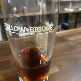 a glass of beer on a table