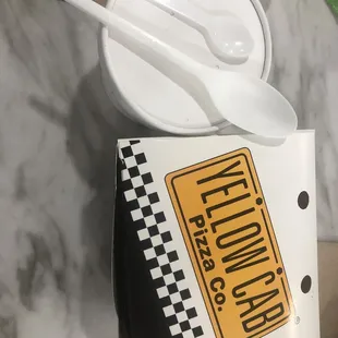 Photo of the tiny spoon I was given for my soup, next to the spoon I had at home. Funny prank!